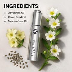 Drop of REJUVENIQE oil on palm showing lightweight texture.