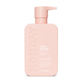 MONDAY Haircare CURL DEFINE bottle on display showing the hydrating formula.