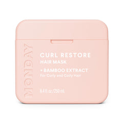 MONDAY Haircare Curl Restore with bamboo extract nourishes curls for hydration and shine.