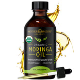Mother Nature Organics Moringa Seed Oil bottle for daily face care and hydration.