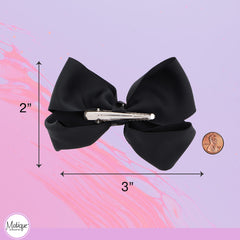 Motique hair accessory enhances little girl's outfits.