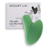 Mount Lai Jade Gua Sha performs forehead strokes for a cooling, smooth facial contour.