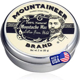 Mountaineer Brand Unscented Mustache Wax tin ready for use, offering long-lasting hold.