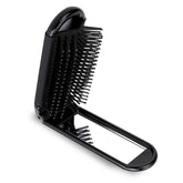 Mozeat Lens folding brush with mirror for on-the-go grooming.
