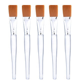 Mudder facial mask brush with clear handle for precise, gentle applications.