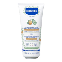 Mustela champú cremoso desenredante en botella, suaviza y desenreda el cabello.