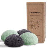 Esponja myHomeBody konjac con carbón activado para limpieza suave y eficaz.