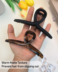 Nalodu damage-free claw clip keeps hair safe from pulling.