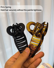 Nalodu thick-hair clip holds long curls without snagging or pulling.