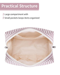 Narwey striped makeup bag dusty rose opened to show compartments for brushes and essentials.