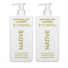 Native 2-in-1 shampoo and conditioner bottle with autumn air amber scent promotes refreshed hair.