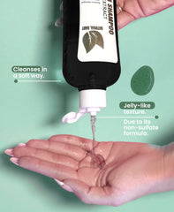 Natural Sant rosemary oil bottle close-up emphasizing calming scalp ritual using botanical ingredients.