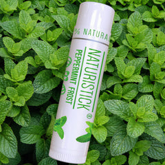 Naturistick Lip Balm glide demonstrates silky softness for makeup prep.