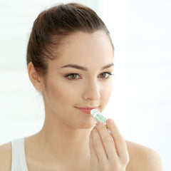 Naturistick Peppermint Lip Balm application demonstrates smooth glide for lip prep.