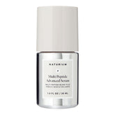 Naturium Multi-Peptide Serum bottle close-up showing smooth texture promise.