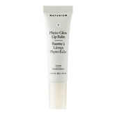 Naturium Phyto-Glow Lip Balm envase claro, hidratación duradera para labios suaves.