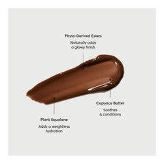 Naturium Phyto-Glow Lip Balm on lips with lacquer-like gloss finish.