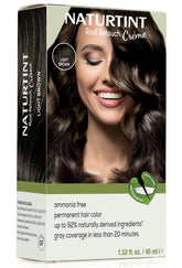 Naturtint Light Brown Root Retouch Cream application for seamless gray blending.