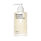Nécessaire body oil bottle front with multi-nutrient formula for radiant skin