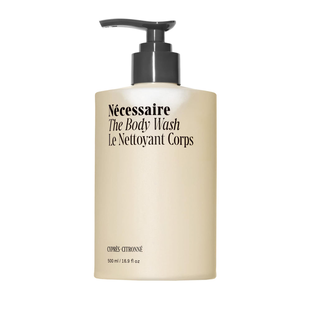 Nécessaire body wash bottle with cypress-lemon scent for a refreshing cleanse.