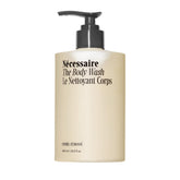 Nécessaire body wash bottle with cypress-lemon scent for a refreshing cleanse.