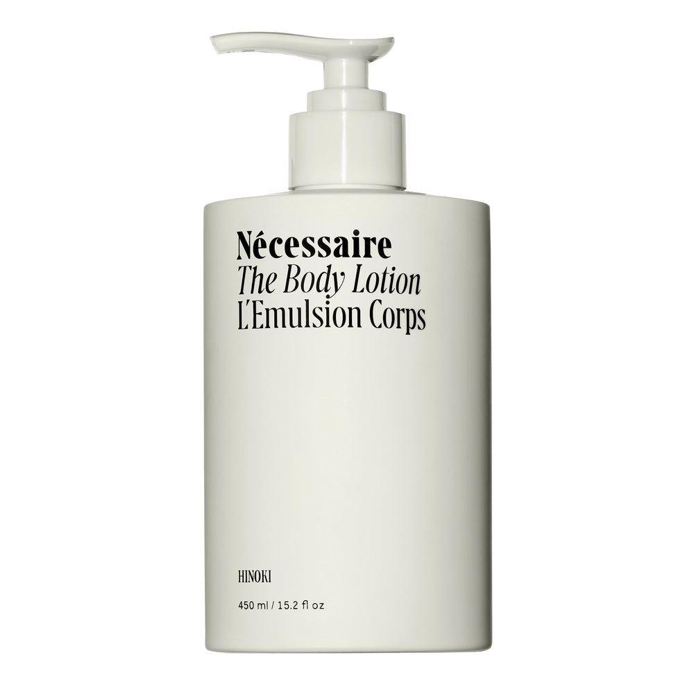 Nécessaire Hinoki body lotion bottle for quick, non-greasy hydration.