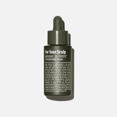 Nécessaire Rosemary Serum dropper for precise scalp application.