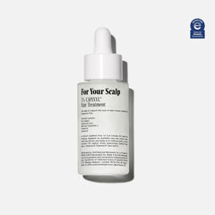 Nécessaire Scalp Serum pipette dispensing demonstrates easy daily application.