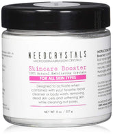 NeedCrystals microdermabrasion crystals jar for at-home exfoliation.