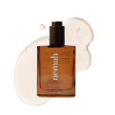 Nemah Belly Oil bottle pour for quick-dry hydration during pregnancy.