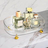 Neotidy perfume organizer bottle-display keeps fragrances neatly showcased.