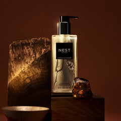 Nest New York Moroccan Amber liquid soap lathering on hands.