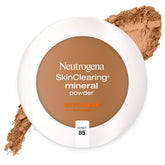 Neutrogena SkinClearing Polvo prensado Honey 85 aplicado con aplicador para cobertura suave y mate