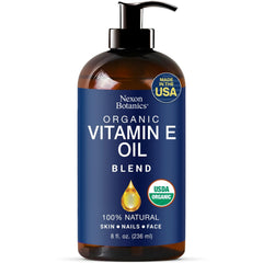 Nexon Botanics Vitamin E oil blend in amber bottle for skin nourishment and protection