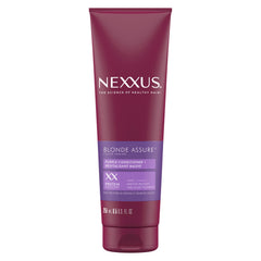 Nexxus Color Assure Purple Conditioner, botella vertiendo, acondiciona y suaviza el cabello rubio.