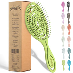 Ninabella detangle brush with spiral-bristle head for gentle detangling.