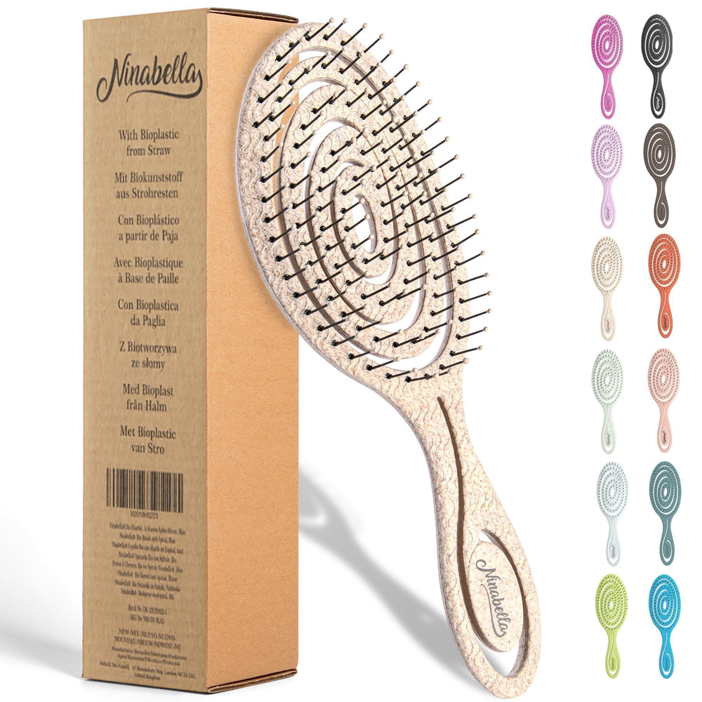 Ninabella Detangle Brush with spiral head for smooth detangling and scalp massage.