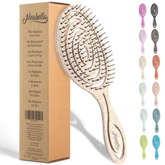 Ninabella Detangle Brush with spiral head for smooth detangling and scalp massage.