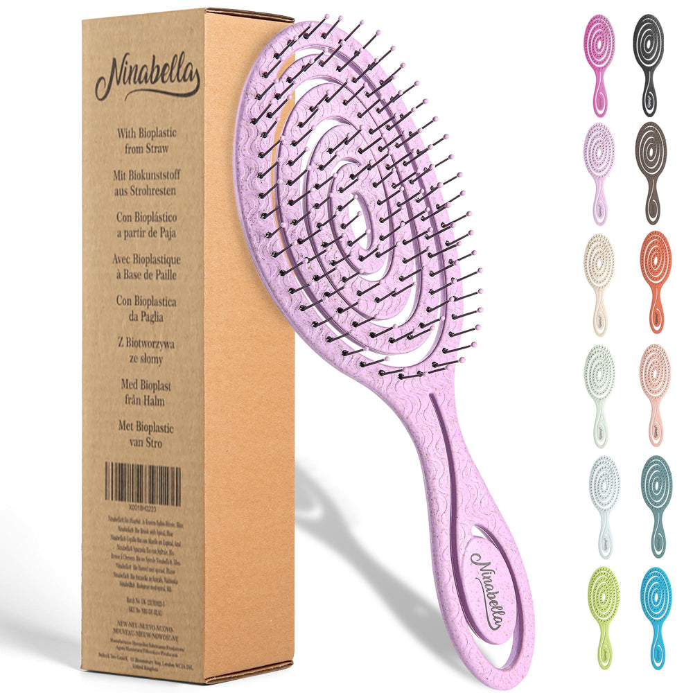 Ninabella detangle brush close-up of spiral head for gentle detangling.