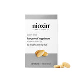 NIOXIN Density Defend bottle close-up signals daily hair growth support.