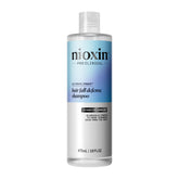 Nioxin Hair Fall Defense Shampoo bottle for a refreshing scalp cleanse.