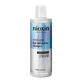 NIOXIN Hair Fall Defense Shampoo bottle ready for daily scalp cleansing and impurities removal.