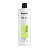 NIOXIN System 2 shampoo bottle highlighting potential thickening for natural hair