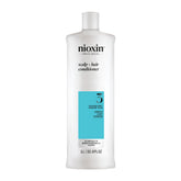 Nioxin System 3 conditioner bottle demonstrates at-home thickening and color-safe conditioning.
