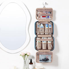 NISHEL hanging organizer unfolds to four compartments for easy packing.