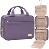 NISHEL travel toiletry bag in purple, open layout reveals four organized compartments.