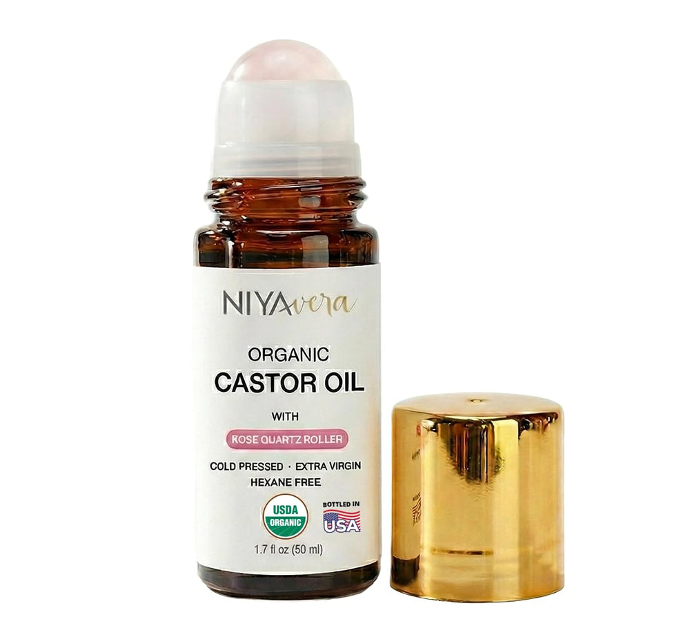 NIYAVERA aceite ricino con rodillo de cuarzo rosa para cuidado facial suave.