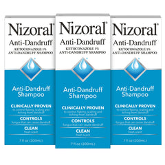 Nizoral anti-dandruff shampoo bottle with fresh scent promotes a clean, flake-free scalp.
