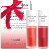NOONI Appleseed Lip Oil Set en botella con dos tonos Appleberry y Appleplum.