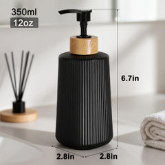 Nortsa Miira glass dispenser close-up showing durable bamboo pump.